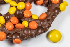 Small candies on pretzel Small candies on pretzel